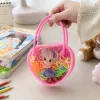 A pink transparent heart-shaped small bag with colorful hair bands and doll decorations details Picture